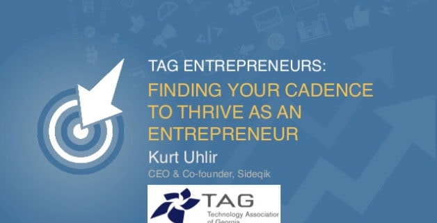 A blue presentation slide with a bullseye and arrow graphic on the left. Text reads: "TAG Entrepreneurs: Finding Your Cadence to Thrive as an Entrepreneur." Below is "Kurt Uhlir, CEO & Co-founder, Sideqik" and the TAG (Technology Association of Georgia) logo.