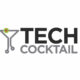 Logo for "TECH COCKTAIL" featuring bold black and gray text. To the left, a martini glass formed from circuit board lines symbolizes healthy communications—central to success—with a green and red olive garnish at the top. White background.