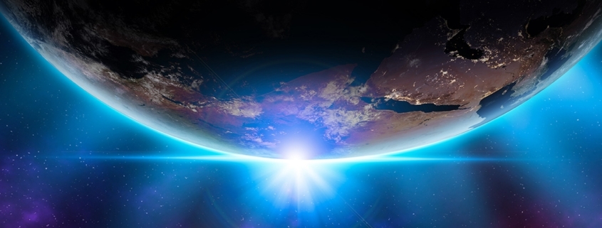 A view of Earth from space with the sun rising behind the planet, casting a bright blue glow on the horizon. Perfect inspiration to create a real estate website as vast and stunning as our world—limitless possibilities beneath a starry sky.