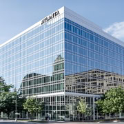 Modern office building in Atlanta, Georgia, with glass facade.